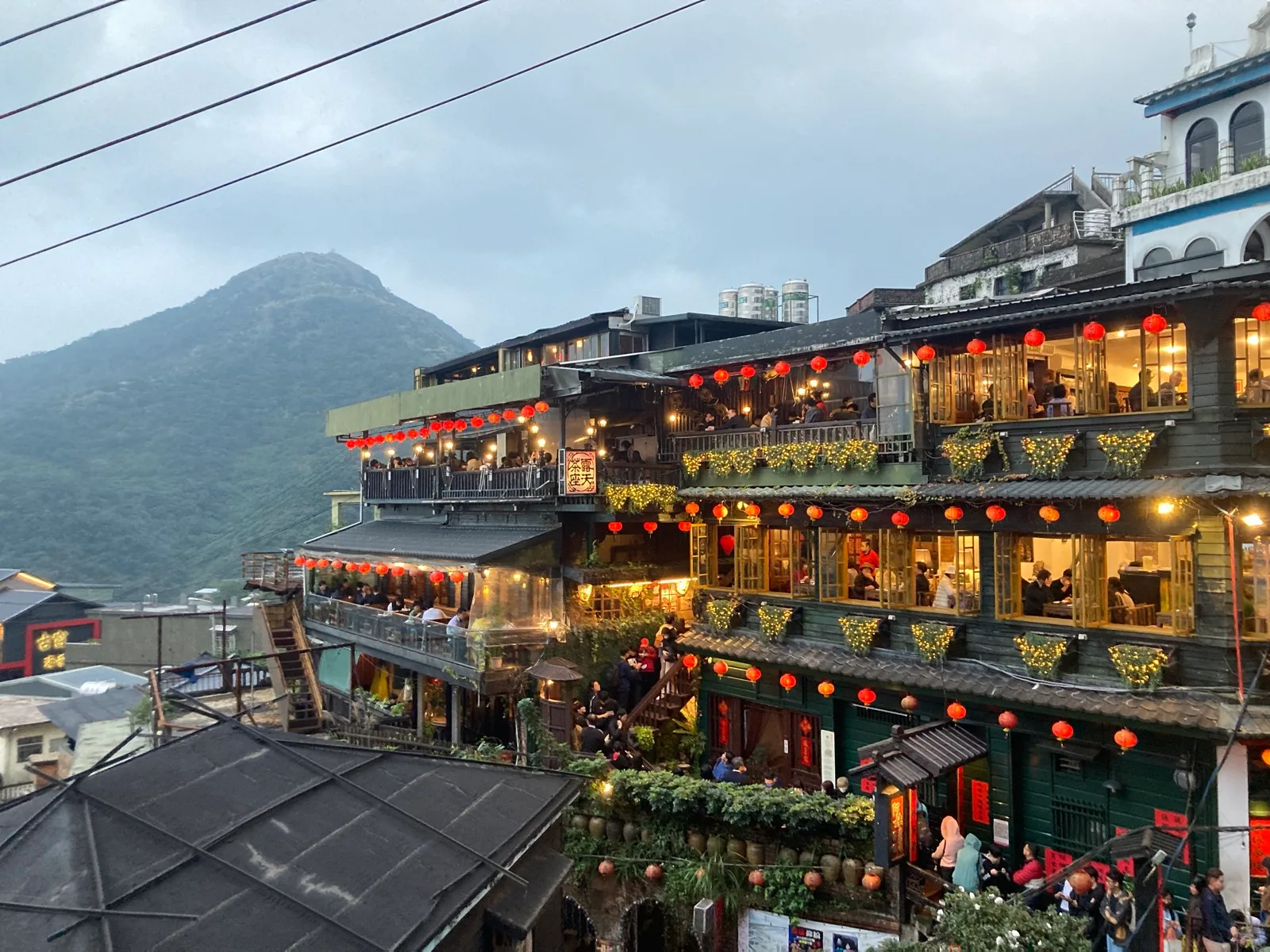 Traveler photograph of Jiufen tea houses, red lanterns and mountain scenery